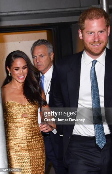 Meghan Markle, Duchess of Sussex, and Prince Harry, Duke of Sussex leave The Ziegfeld Theatre on May 16, 2023 in New York City.