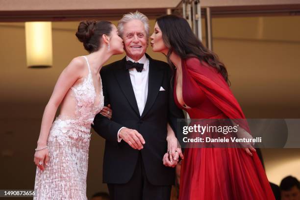 Carys Zeta Douglas, Michael Douglas and Catherine Zeta-Jones attend the "Jeanne du Barry" Screening & opening ceremony red carpet at the 76th annual...