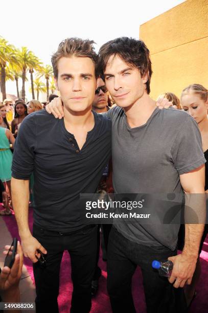 Actors Paul Wesley and Ian Somerhalder arrive at the 2012 Teen Choice Awards at Gibson Amphitheatre on July 22, 2012 in Universal City, California.
