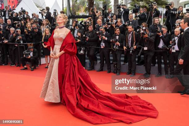 Uma Thurman attends the "Jeanne du Barry" Screening & opening ceremony red carpet at the 76th annual Cannes film festival at Palais des Festivals on...