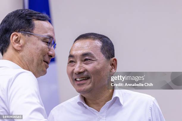 S Presidential candidate, Hou You-ih , shake hands with the KMT's chairman, Eric Chu , at a KMT Central Standing Committee meeting on May 17, 2023 in...