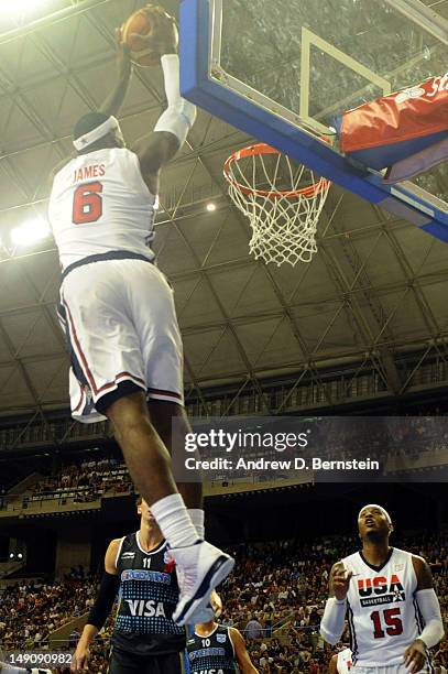 Lebron James of the US Men's Senior National Team attempts a dunk during a game against the Argentinean Men's Senior National Team at Palau Sant...