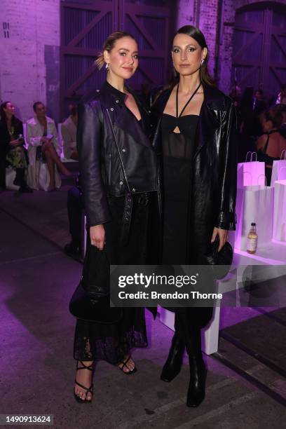 April Rose Pengilly and Laura Dundovic attend the Karla Spetic show during Afterpay Australian Fashion Week 2023 at Carriageworks on May 17, 2023 in...