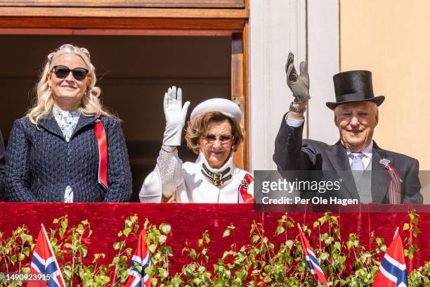 Crown Princess Mette Marit, Her Majesty Queen Sonja and His Majesty King Harald attend the children's parade at the Royal Castle on Norway's National...