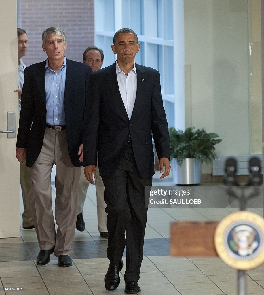 US President Barack Obama arrives alongs