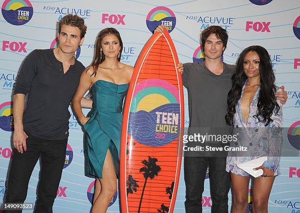 Actors Paul Wesley, Nina Dobrev, Ian Somerhalder and Kat Graham poses in the press room during the 2012 Teen Choice Awards at Gibson Amphitheatre on...