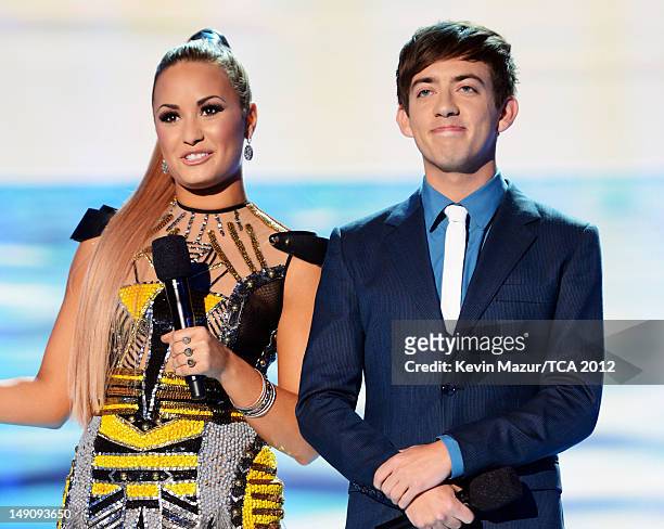 Hosts Demi Lovato and Kevin McHale speak onstage during the 2012 Teen Choice Awards at Gibson Amphitheatre on July 22, 2012 in Universal City,...