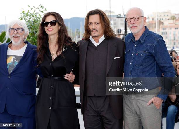 Pierre Richard, Maïwenn, Johnny Depp and Pascal Greggory attend the "Jeanne du Barry" photocall at the 76th annual Cannes film festival at Palais des...