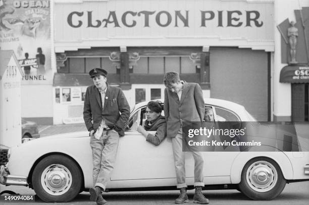 English pop group Blur pose with a Jaguar Mark 2 car by Clacton Pier in Clacton-on-Sea, Essex, March 1993. Left to right: guitarist Graham Coxon,...