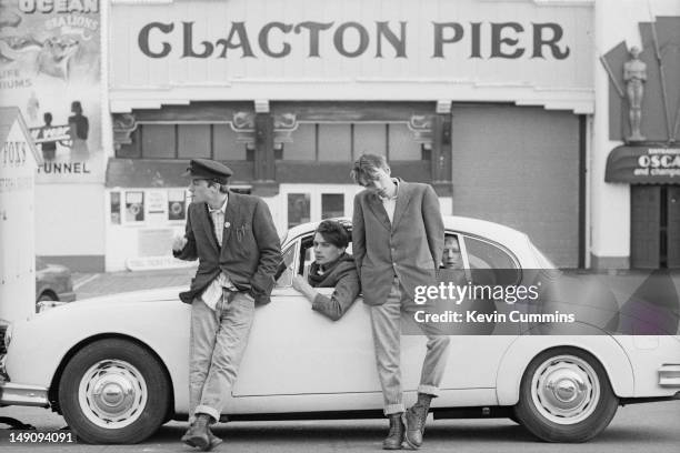 English pop group Blur pose with a Jaguar Mark 2 car by Clacton Pier in Clacton-on-Sea, Essex, March 1993. Left to right: guitarist Graham Coxon,...