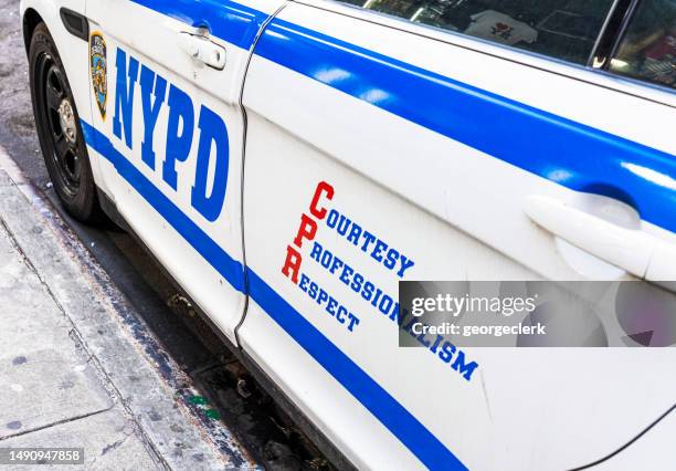 nypd car on the street - new york city police department stock pictures, royalty-free photos & images