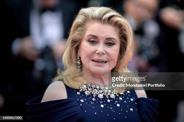 French actress and film producer Catherine Deneuve at Cannes Film Festival 2023. Opening ceremony and red carpet of film Jeanne du Barry. Cannes ,...