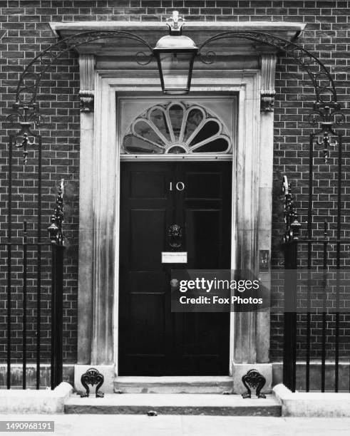 The door of 10 Downing Street, the official residence of the UK Prime Minister, on Downing Street, off Whitehall in London, England, November 1971.