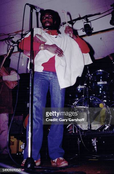 Jamaican Reggae, Soul, & Ska musician Jimmy Cliff performs, with members of his band, onstage at My Father's Place, Roslyn, New York, November 25,...