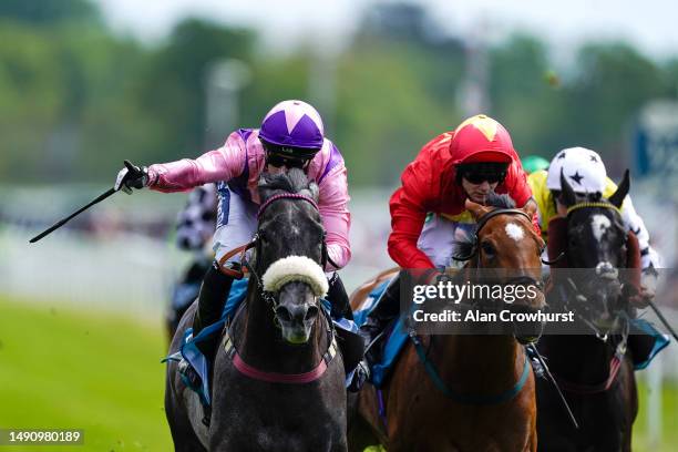 Paul Mulrennan riding Azure Blue win The 1895 Duke Of York Clipper Stakes at York Racecourse on May 17, 2023 in York, England.