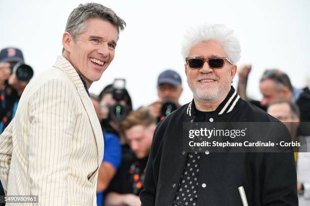 Ethan Hawke and Pedro Almodovar attend the "Strange Way Of Life" photocall at the 76th annual Cannes film festival at Palais des Festivals on May 17,...