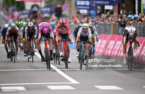 Jonathan Milan of Italy and Team Bahrain - Victorious - Purple Points Jersey, Mads Pedersen of Denmark and Team Trek - Segafredo, Mark Cavendish of...