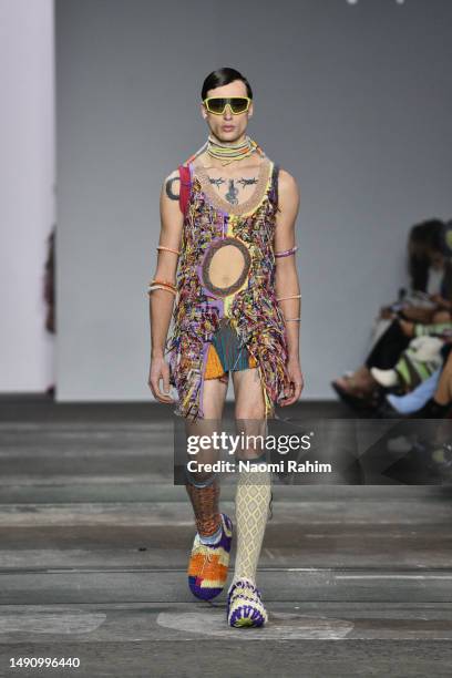 Model walks the runway in a design by Christopher Daod during the The Innovators: Fashion Design Studio TAFE NSW show during Afterpay Australian...