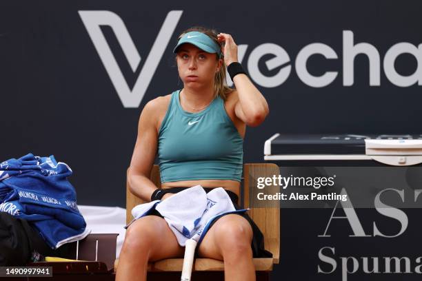 Paula Badosa of Spain reacts from the bench against Jelena Ostapenko of Latvia during their Women's Singles quarter-final match on day ten of...