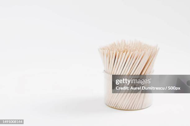 close-up of brush in container against white background,romania - zahnstocher stock-fotos und bilder