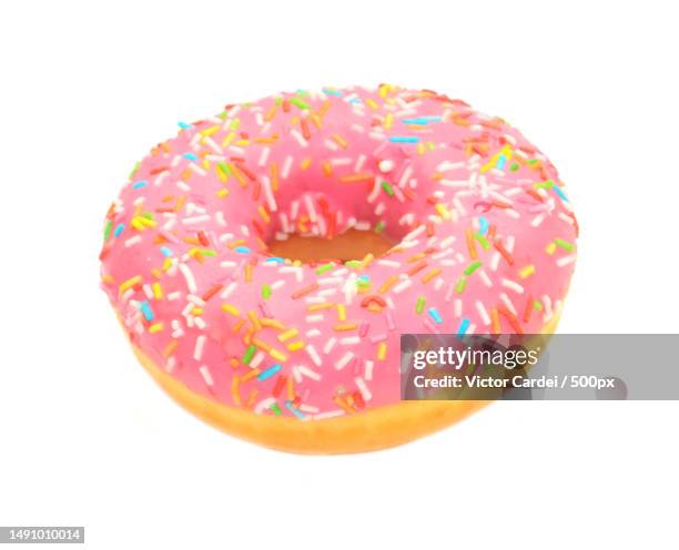 pink glazed donut isolated on white background,romania - doughnut stock pictures, royalty-free photos & images