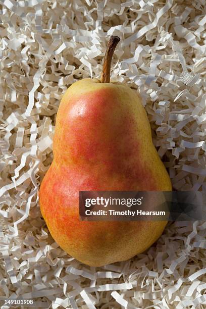 bartlett pear with a rosy blush - packing peanuts stock pictures, royalty-free photos & images