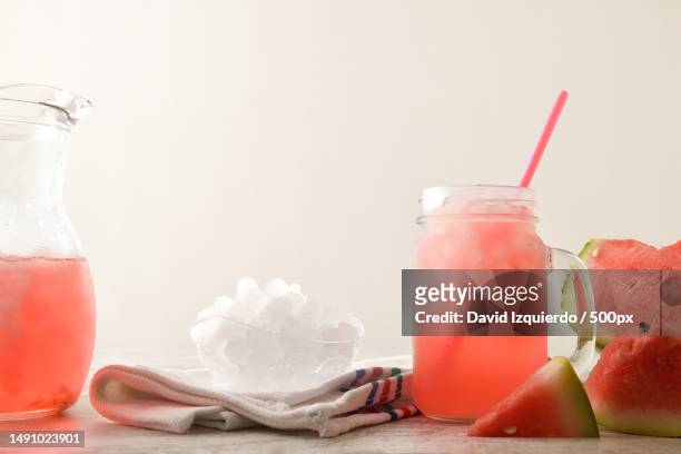freshly prepared watermelon drink with crushed ice,spain - slush stock-fotos und bilder