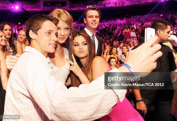 Singer Taylor Swift and actress Selena Gomez attend the 2012 Teen Choice Awards at Gibson Amphitheatre on July 22, 2012 in Universal City, California.