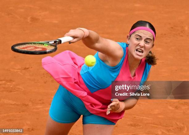 Jelena Ostapenko of Latvia serves against Paula Badosa of Spain during their Women's Singles quarter-final match on day ten of Internazionali BNL...