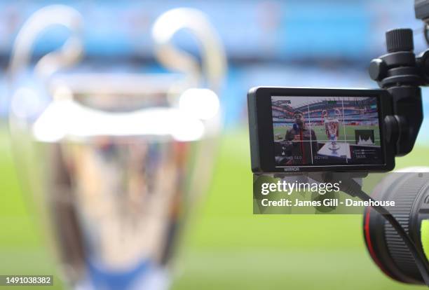 The Champions League Trophy is filmed while on display ahead of the UEFA Champions League semi-final second leg match between Manchester City FC and...