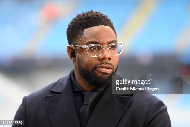 Micah Richards, former Manchester City player looks on prior to the UEFA Champions League semi-final second leg match between Manchester City FC and...