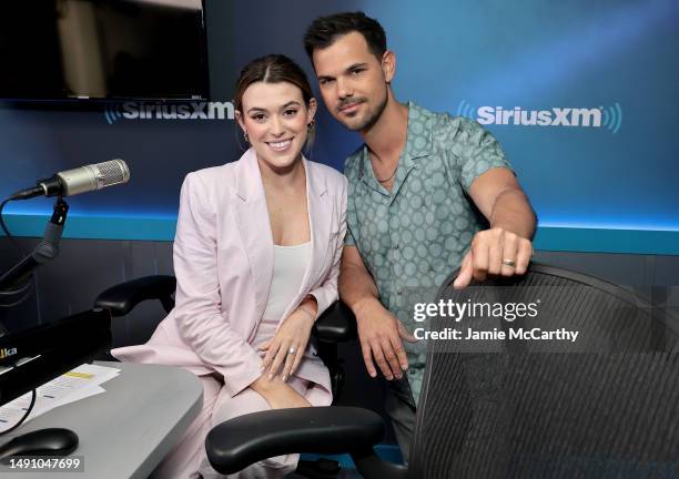 Tay Lautner and Taylor Lautner visit SiriusXM at SiriusXM Studios on May 17, 2023 in New York City.