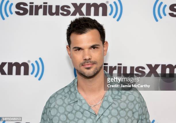 Taylor Lautner visits SiriusXM at SiriusXM Studios on May 17, 2023 in New York City.