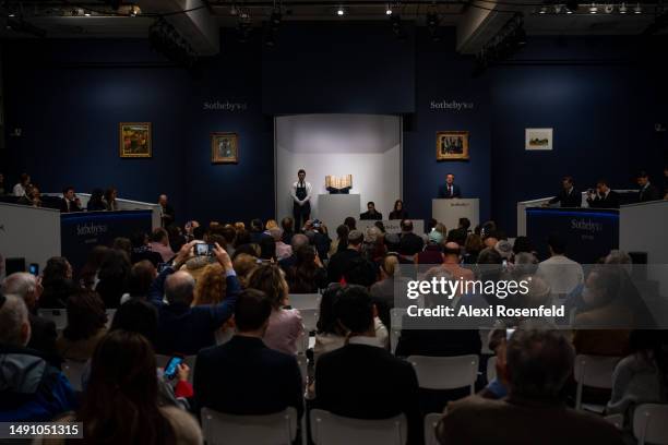 Auctioneer Benjamin Doller, takes bids for The Codex Sassoon during the auction at Sotheby's on May 17 , 2023 in New York City. The codex, which was...