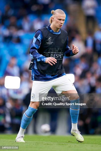 Erling Haaland of Manchester City warms up prior to the UEFA Champions League semi-final second leg match between Manchester City FC and Real Madrid...