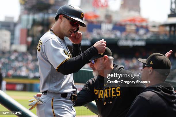 Bryan Reynolds of the Pittsburgh Pirates celebrates scoring a seventh inning run while playin the Detroit Tigers at Comerica Park on May 17, 2023 in...