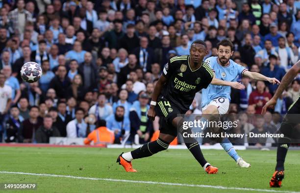 Bernardo Silva of Manchester City scores their teams first goal during the UEFA Champions League semi-final second leg match between Manchester City...