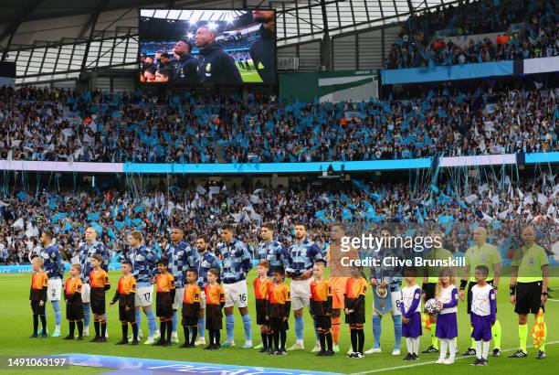 Manchester City players line up on the pitch prior to the UEFA Champions League semi-final second leg match between Manchester City FC and Real...