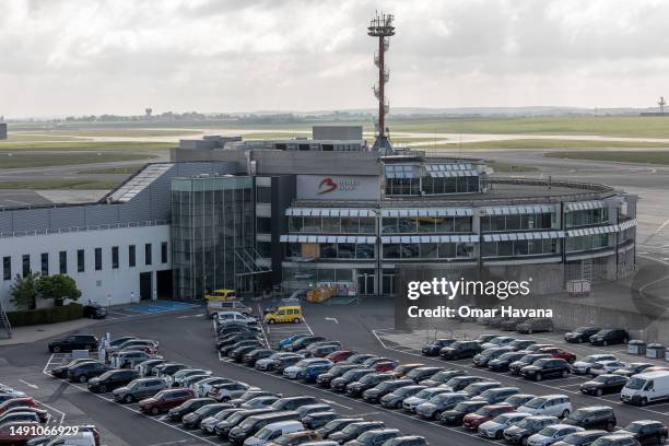 Dozens of cars are parked next to the Brussels airport offices near the passenger terminals on May 17, 2023 in Brussels, Belgium. Brussels Airport is...