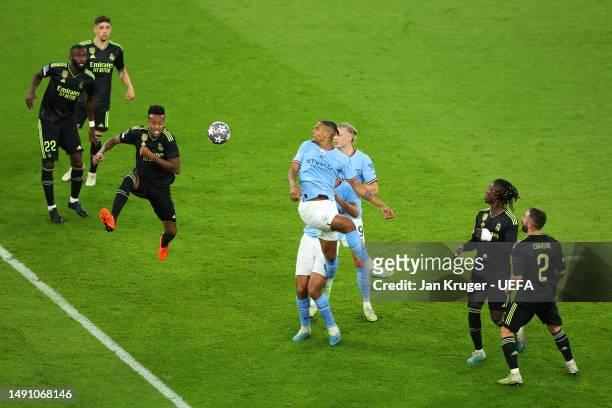 Manuel Akanji of Manchester City heads the ball before an own goal by Eder Militao of Real Madrid, Manchester City's third goal during the UEFA...