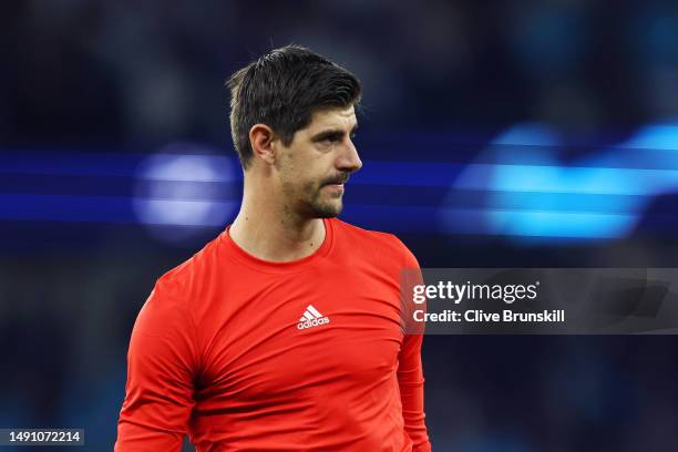 Thibaut Courtois of Real Madrid looks dejected following the team's defeat during the UEFA Champions League semi-final second leg match between...