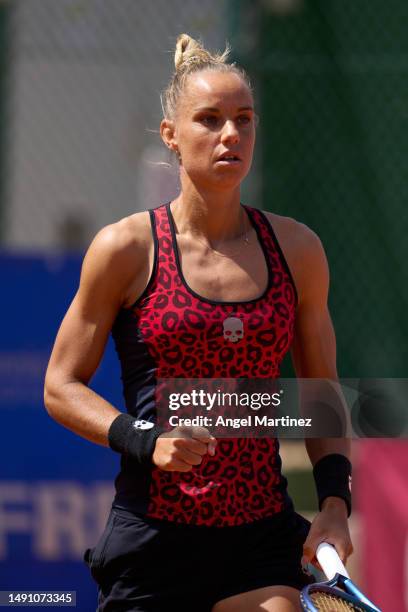 Arantxa Rus of Netherlands celebrates in her first round doubles match against Emily Appleton of Great Britain and Bibiane Schoofs of Netherlands...