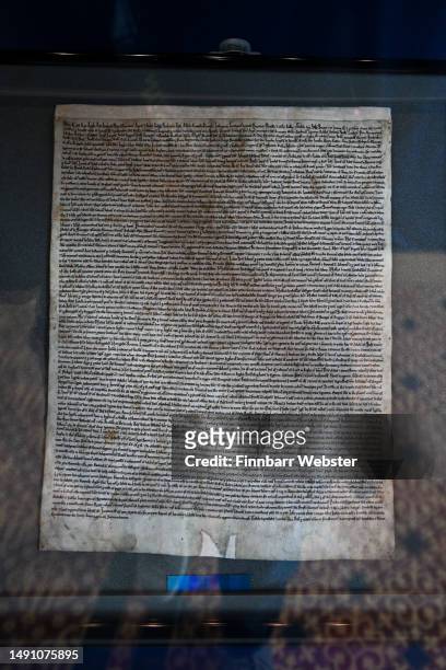 One of only four surviving Magna Carta documents from 1215 is seen on display at Salisbury Cathedral, on May 17, 2023 in Salisbury, England. The...