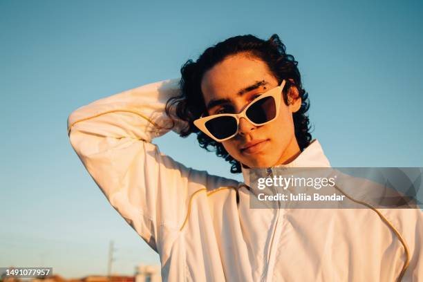 young man with cool attitude outdoor portrait - teenager attitude stock pictures, royalty-free photos & images