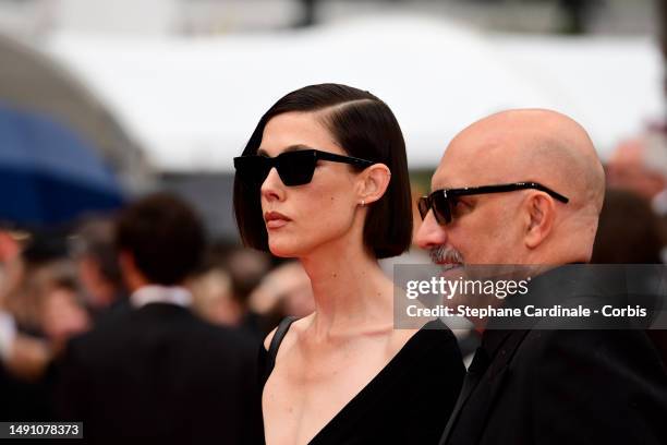 Gaspar Noé and gues attends the "Monster" red carpet during the 76th annual Cannes film festival at Palais des Festivals on May 17, 2023 in Cannes,...