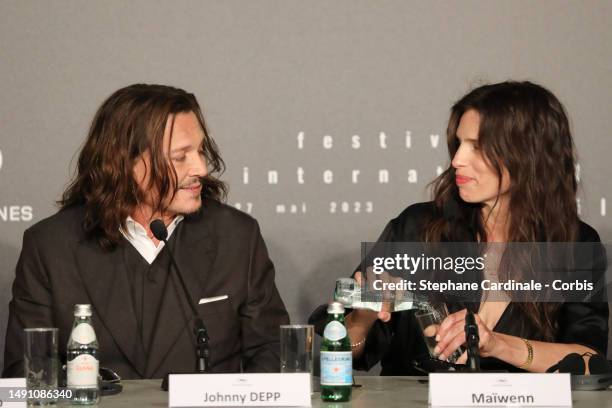 Johnny Depp and Maiwenn attend the "Jeanne Du Barry" press conference at the 76th annual Cannes film festival at Palais des Festivals on May 17, 2023...