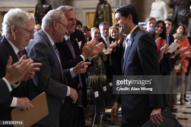 Former U.S. Speaker of the House and former Rep. Paul Ryan greets Speaker of the House Rep. Kevin McCarthy , Senate Majority Leader Chuck Schumer and...