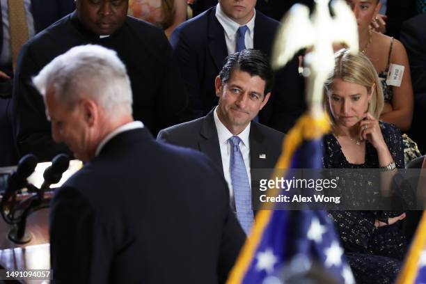 Former U.S. Speaker of the House and former Rep. Paul Ryan and his wife Janna listens to Speaker of the House Rep. Kevin McCarthy during his portrait...