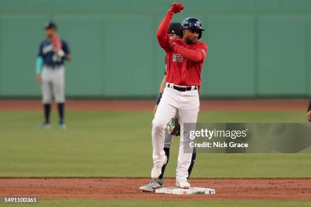 Pablo Reyes of the Boston Red Sox reacts after hitting an RBI double during the first inning against the Seattle Mariners at Fenway Park on May 17,...