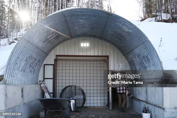 In this image released on May 17 NASA SnowEx campaign researcher John Chapman, technologist, tours the Permafrost Tunnel Research Facility, which...